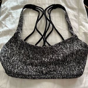 Lululemon Athletica black/white size 4 sports bra.